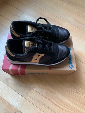 Saucony black with gold